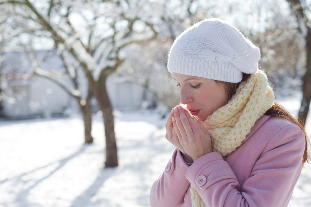 Closeup portrait of beautiful young girl in winter day