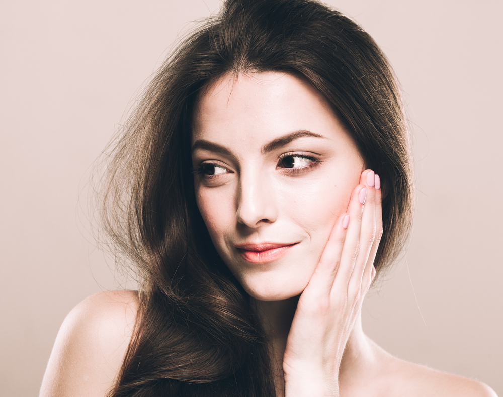 Beautiful young woman portrait cute tender pure smiling posing attractive nature background