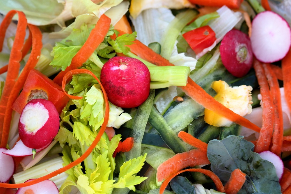 Fresh vegetable scraps left over from making a salad. They can be given to pigs or chickens rather than being thrown out as waste.