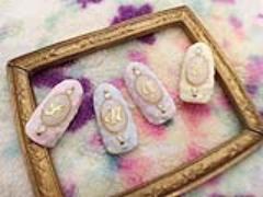 立体的なモコモコ生地感がかわいいニットネイルのデザイン