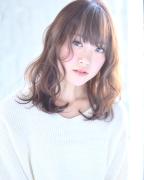 コテパーマで女性らしさアップ！ゆる巻きヘアを手に入れる方法