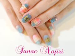 見た目もあったかかわいい。チェック柄ネイルを上手に取り入れて指先から春を感じる